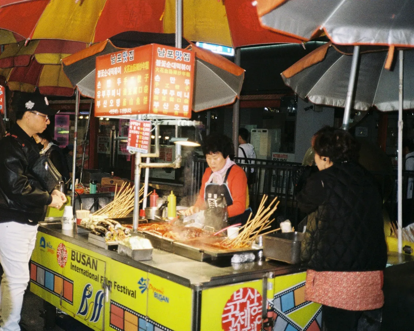 Street food vendors at a market in Busan